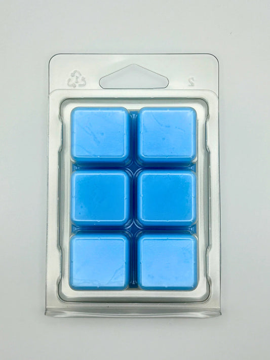 Bergamot Beach 85g wax melt pack, by Hellomelts, showcasing the back with bergamot, lily, and coconut notes, ready to evoke a seaside escape.