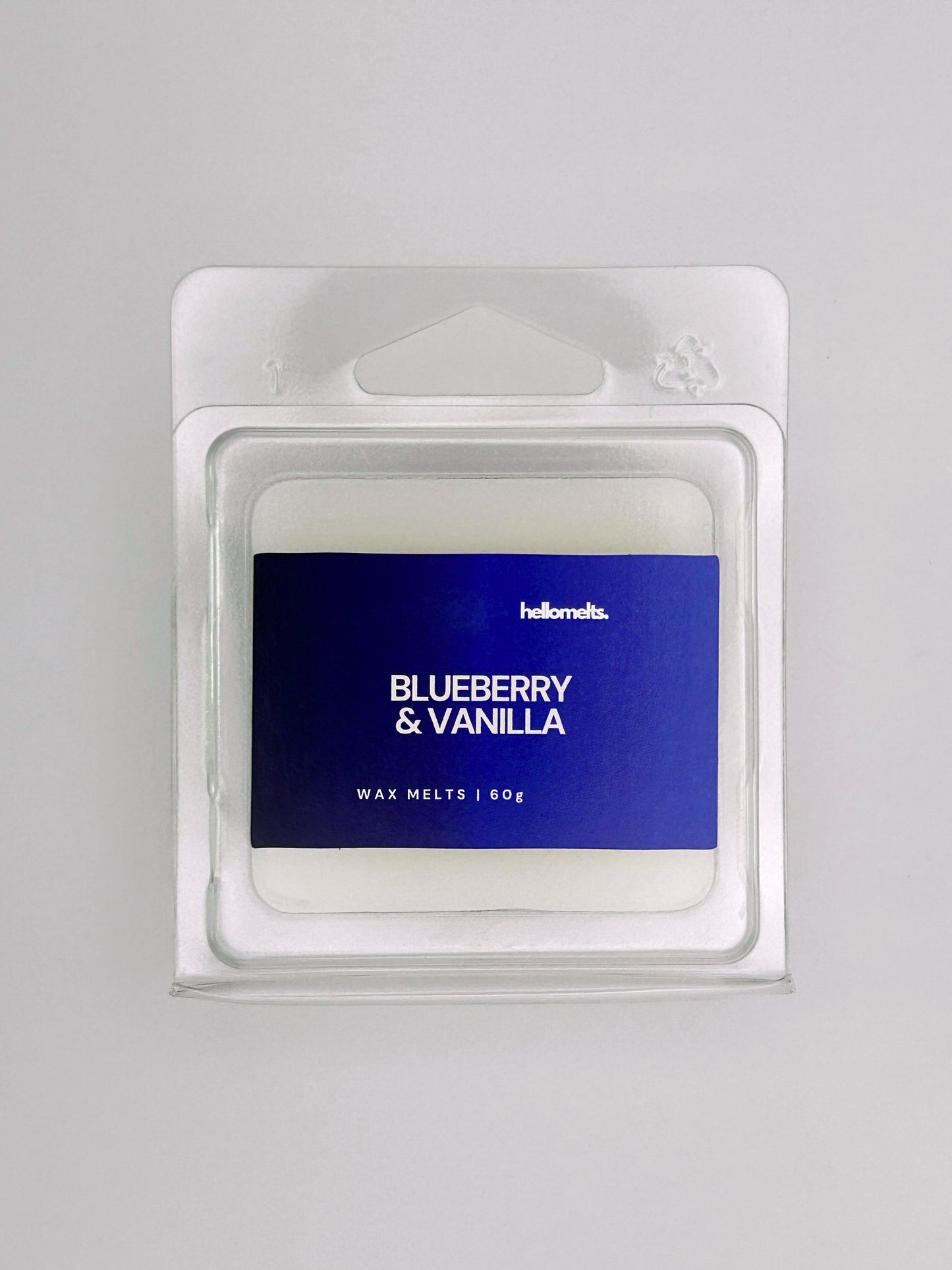 Close-up front view of Blueberry & Vanilla 60g wax melt bar by Hellomelts, showing rich label colour tones and wax texture