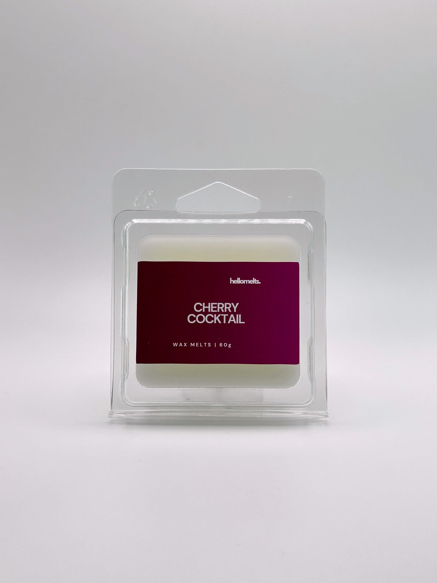 Front-facing view of Hellomelts Cherry Cocktail 60g wax melt bar from the Summer Collection, with vibrant red label and compact clamshell packaging