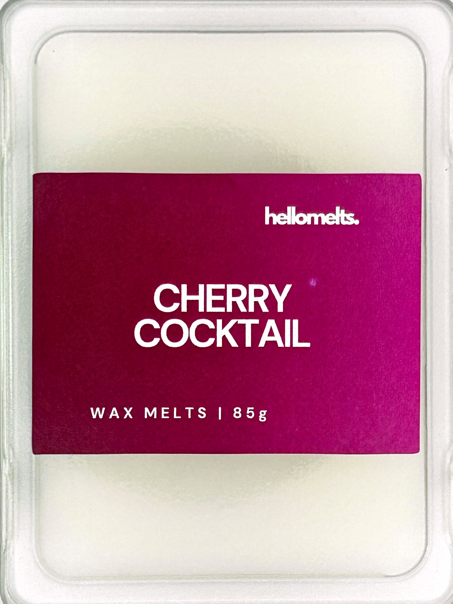 Close-up of the Cherry Cocktail 85g wax melt label, showing detailed Hellomelts branding and rich cherry-inspired design