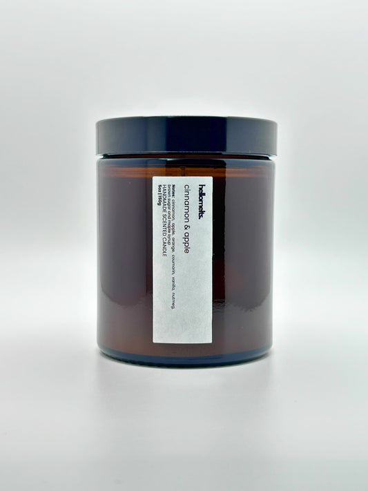 Front view of Cinnamon & Apple autumn candle by Hellomelts with the lid on, part of the Autumn Collection