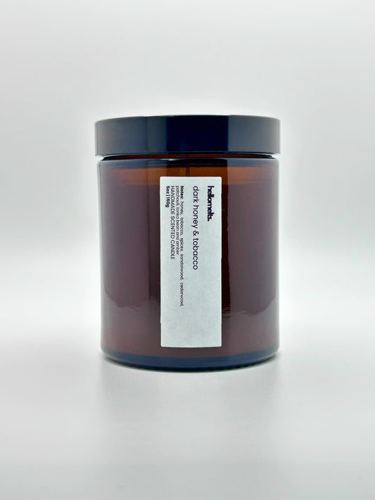 Front view of Dark Honey & Tobacco autumn candle by Hellomelts with the lid on, part of the Autumn Collection
