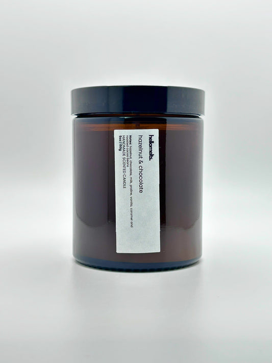 Front view of Hazelnut & Chocolate autumn candle by Hellomelts with the lid on, part of the Autumn Collection