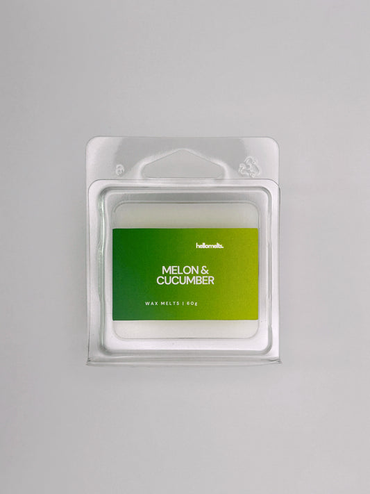 Flatlay of Melon & Cucumber 60g wax melt bar by Hellomelts, part of the Summer Collection with clean white wax and bright green label