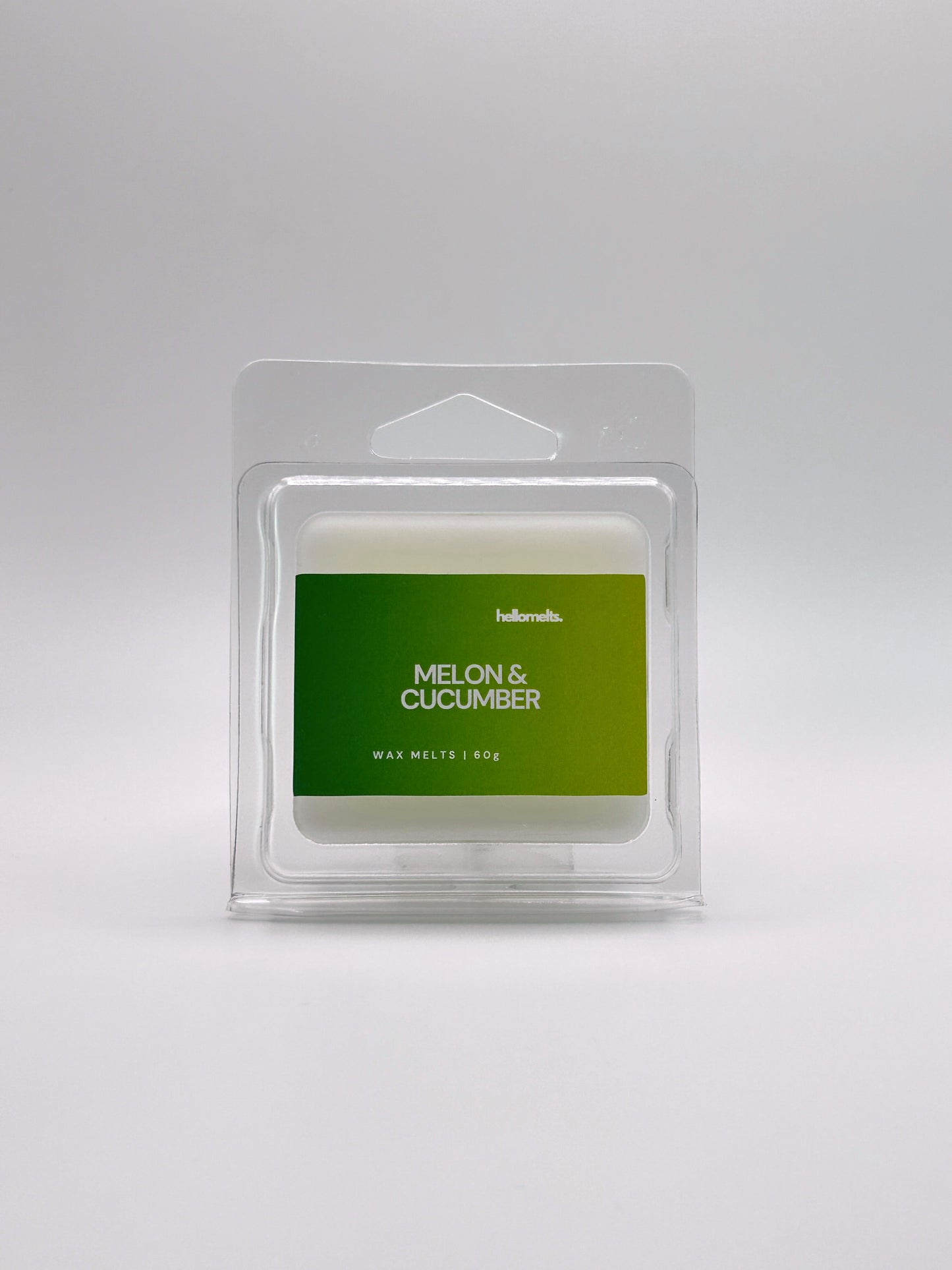 Front-facing view of Hellomelts Melon & Cucumber 60g wax melt bar from the Summer Collection, featuring fresh green label design clamshell packaging