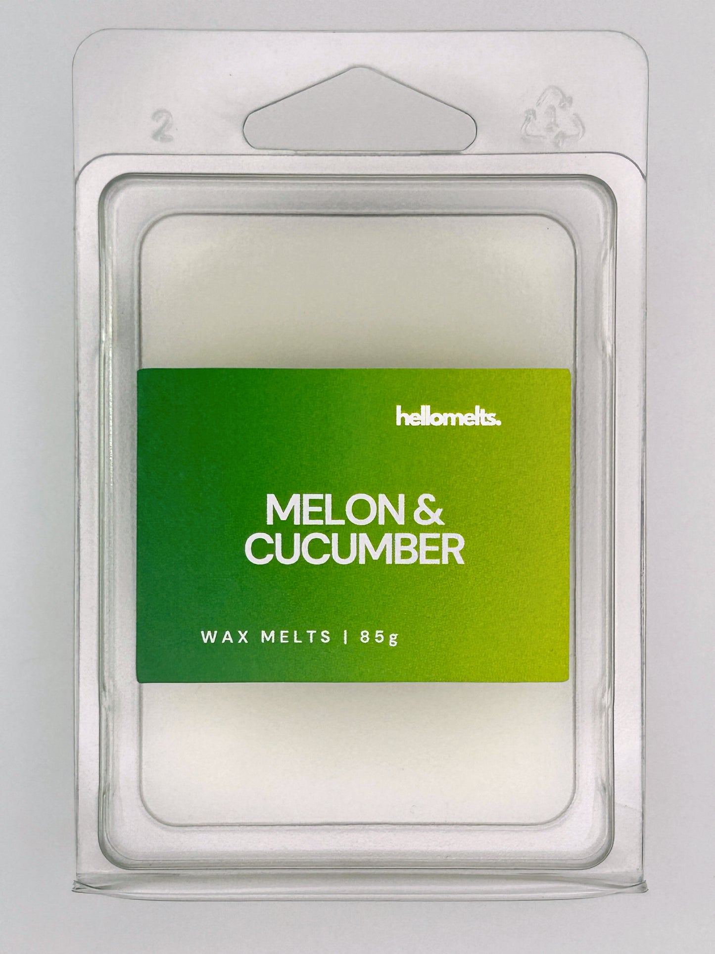 Close-up front view of Melon & Cucumber 85g wax melt bar by Hellomelts, showing clean wax finish and vibrant green label