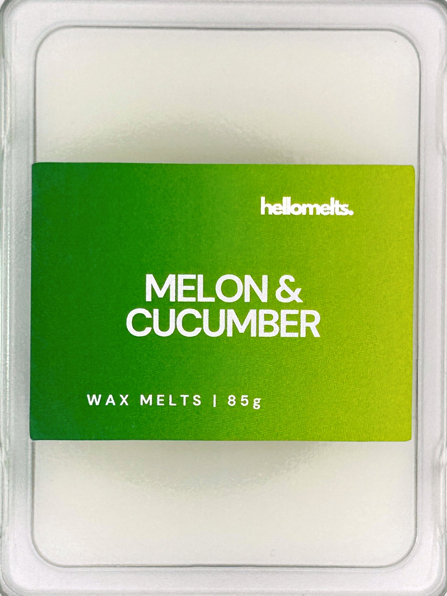 Close-up of the Melon & Cucumber 85g wax melt label, showing detailed Hellomelts branding and refreshing summer scent design