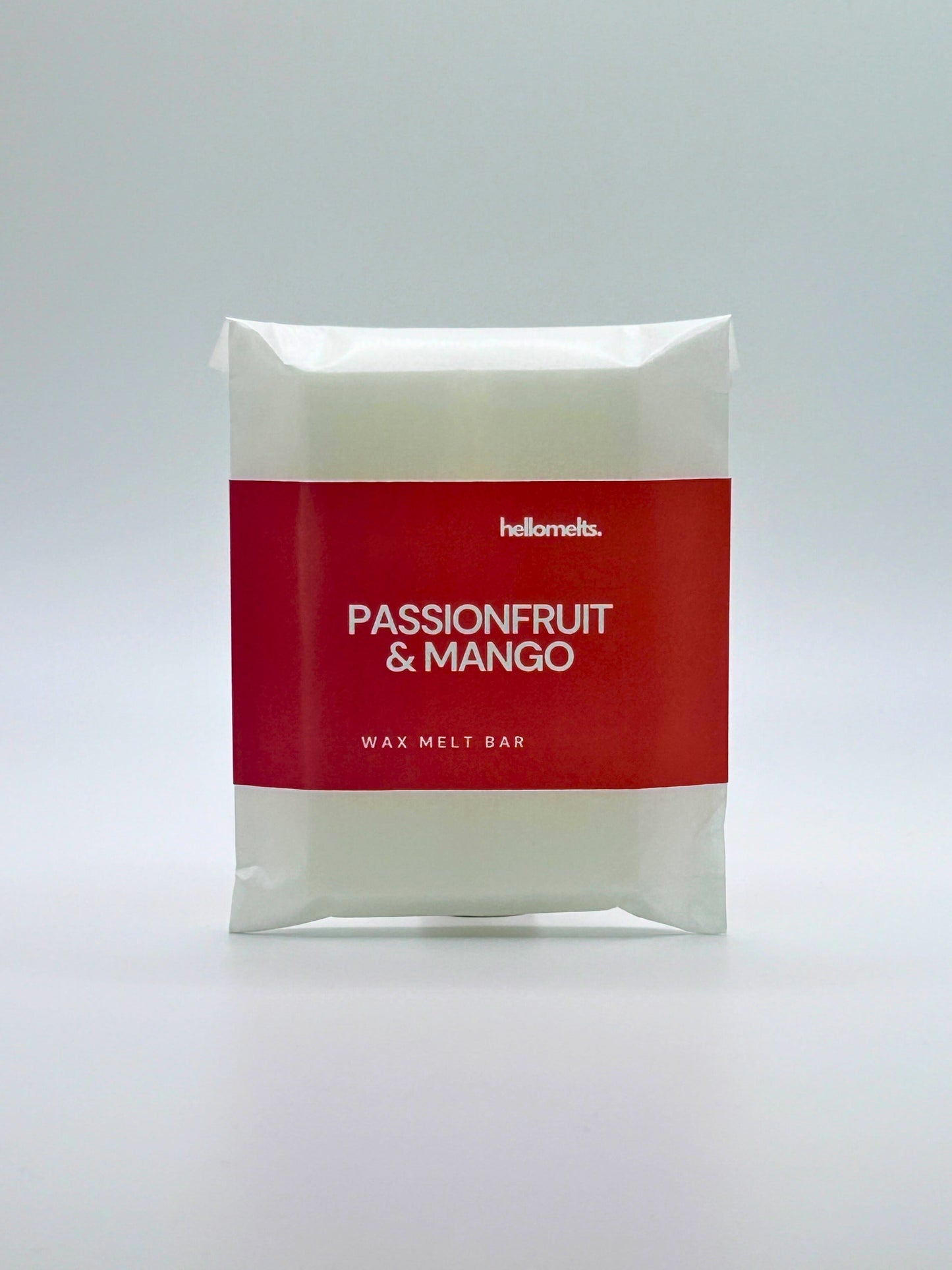 Front-facing view of the Passionfruit & Mango 30g wax melt bar, hand-poured by Hellomelts in signature red summer label.