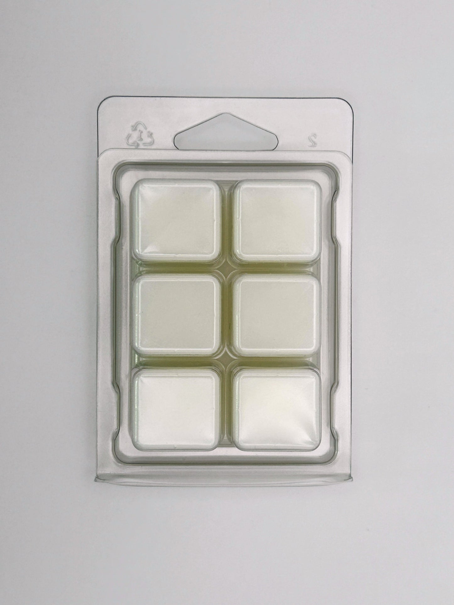 Back view of the Passionfruit & Mango 85g wax melt packaging, showing cubed bar design