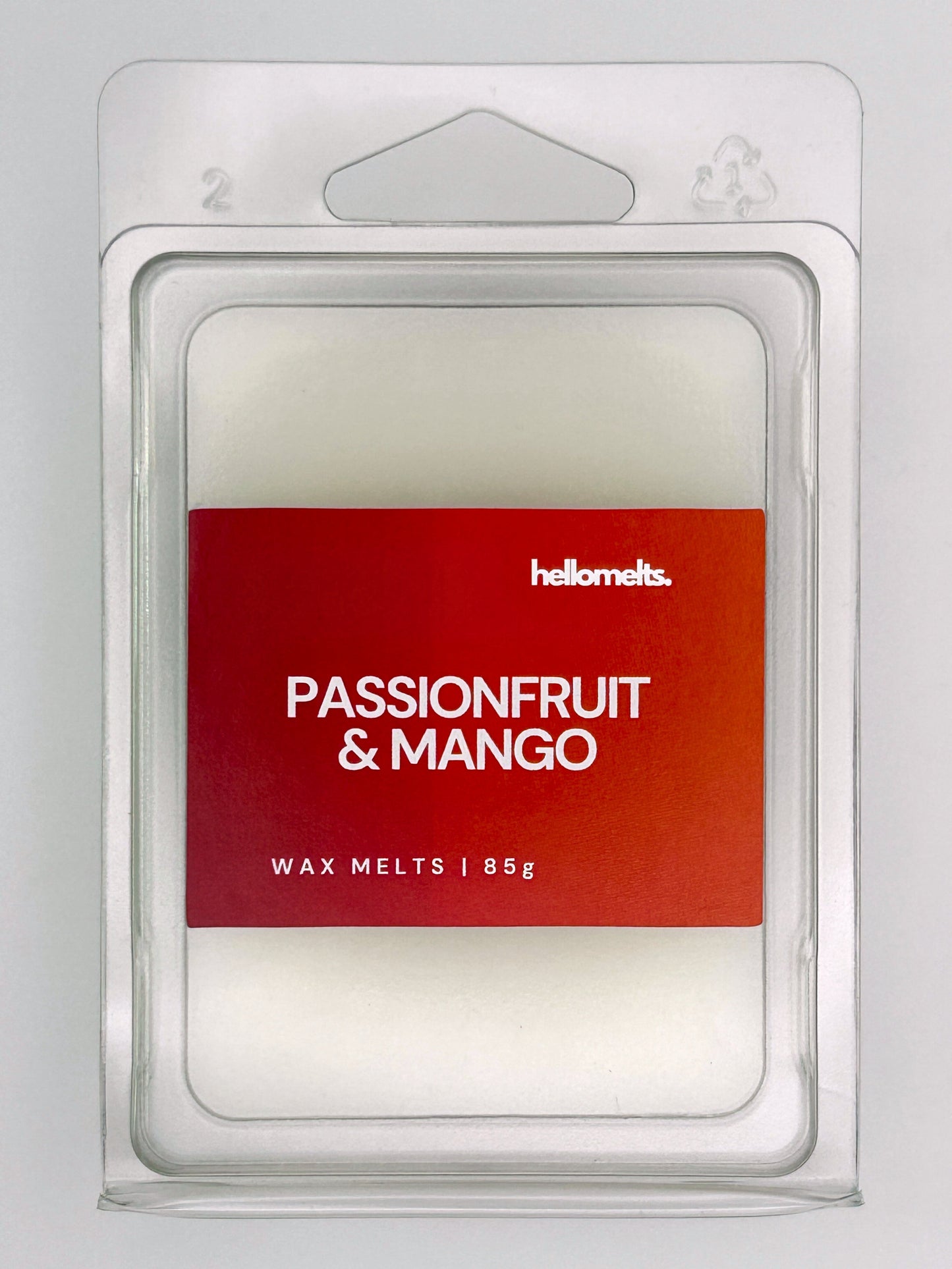 Close-up front view of Passionfruit & Mango 85g wax melt bar by Hellomelts, showing wax texture and bold label colour
