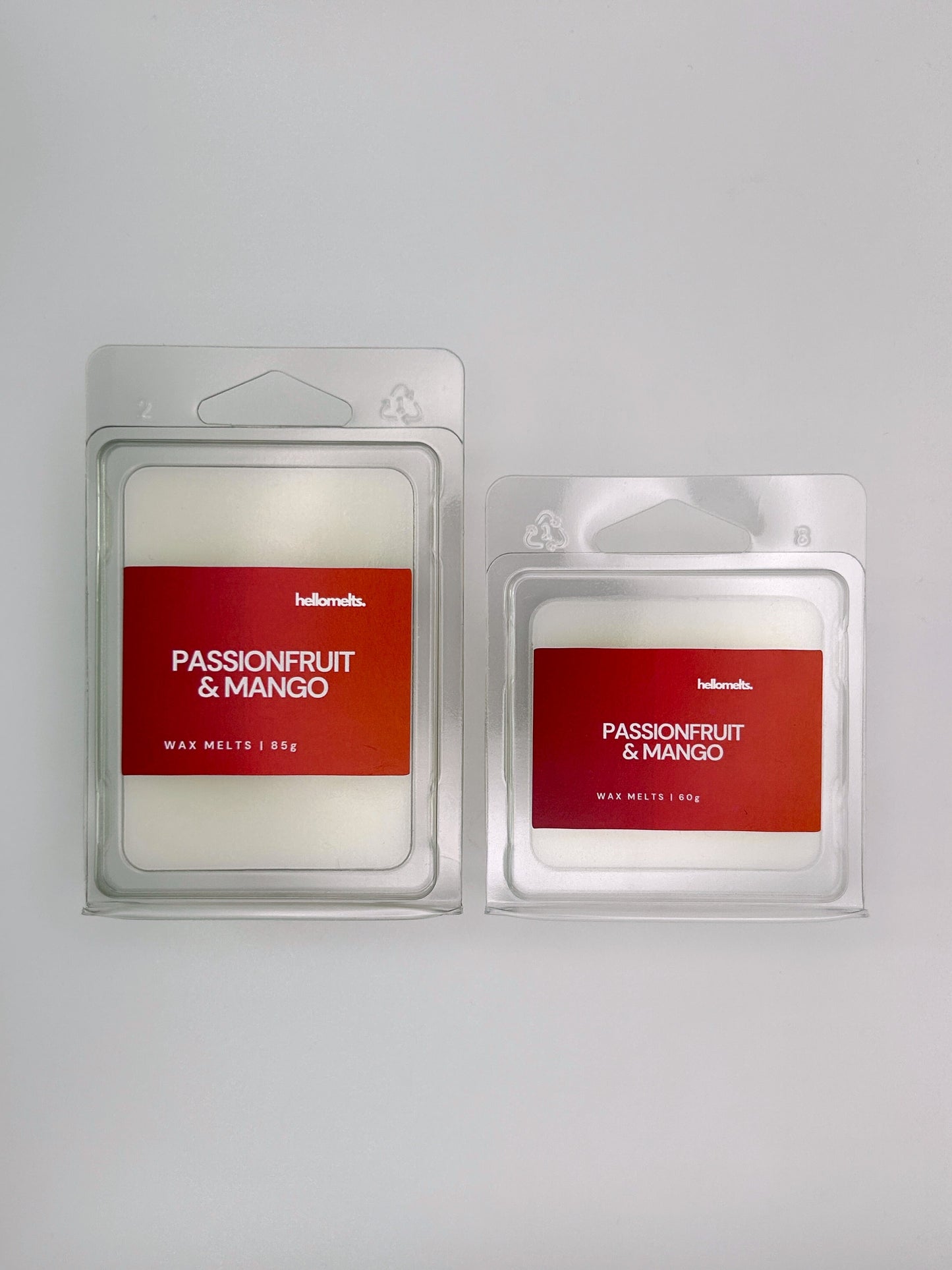 Side-by-side view of Hellomelts Passionfruit & Mango wax melts in both 85g and 60g sizes from the Summer Collection