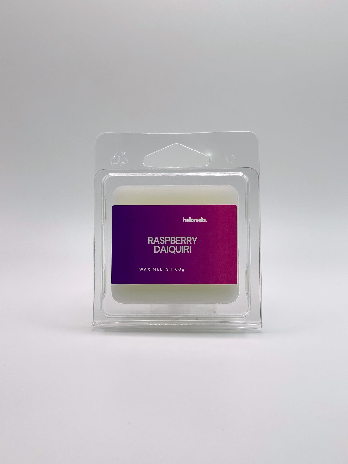 Front-facing view of Hellomelts Raspberry Daiquiri 60g wax melt bar from the Summer Collection, featuring bold fruity packaging