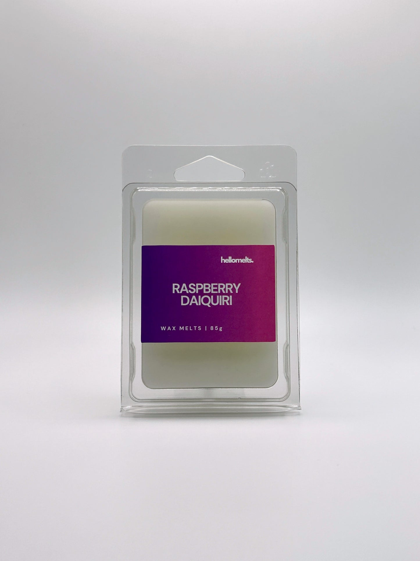 Front-facing view of Hellomelts Raspberry Daiquiri 85g wax melt bar from the Summer Collection, featuring bold fruity packaging