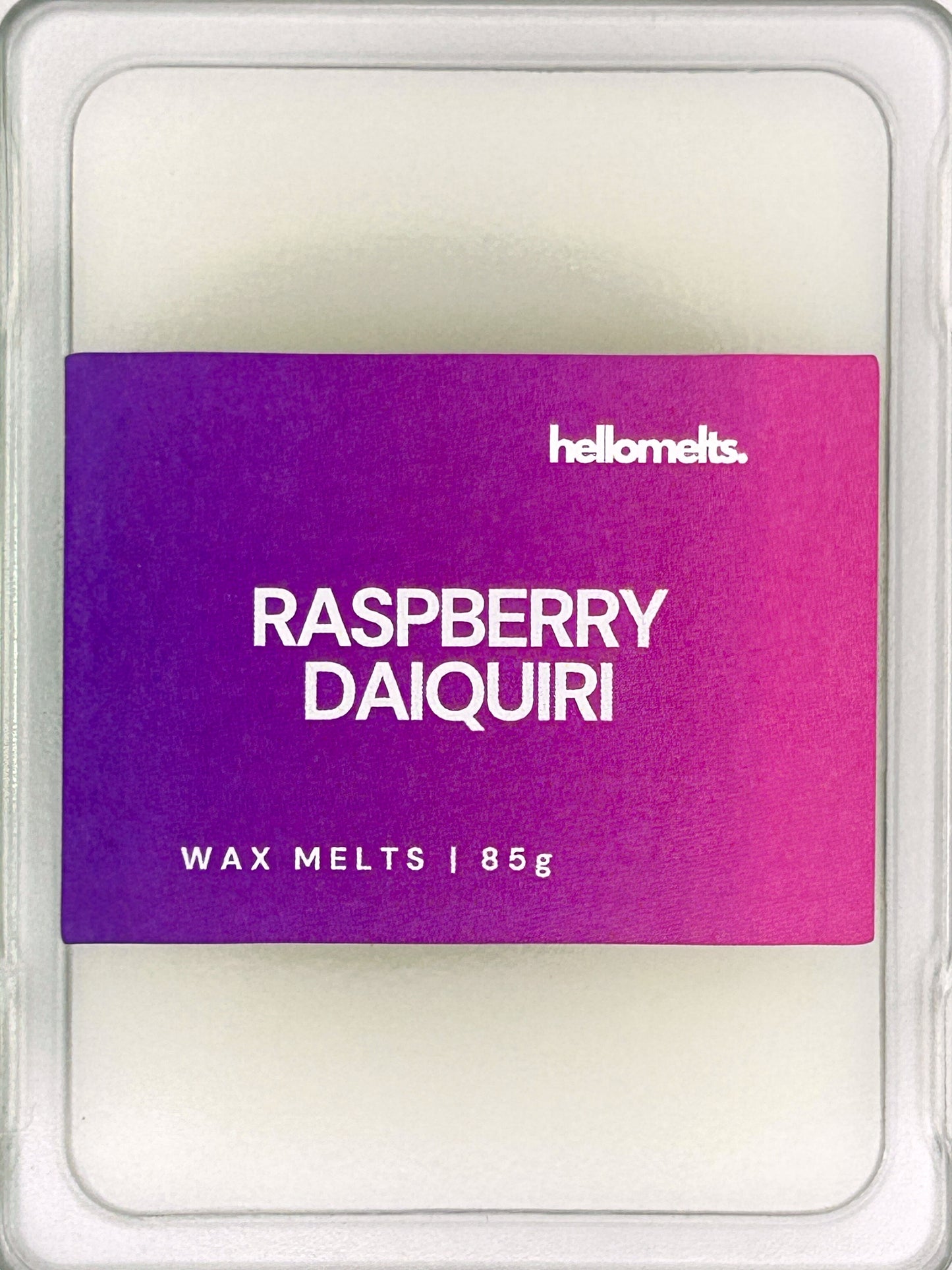 Close-up of the Raspberry Daiquiri 85g wax melt label, showing detailed branding and cocktail-inspired scent design from Hellomelts