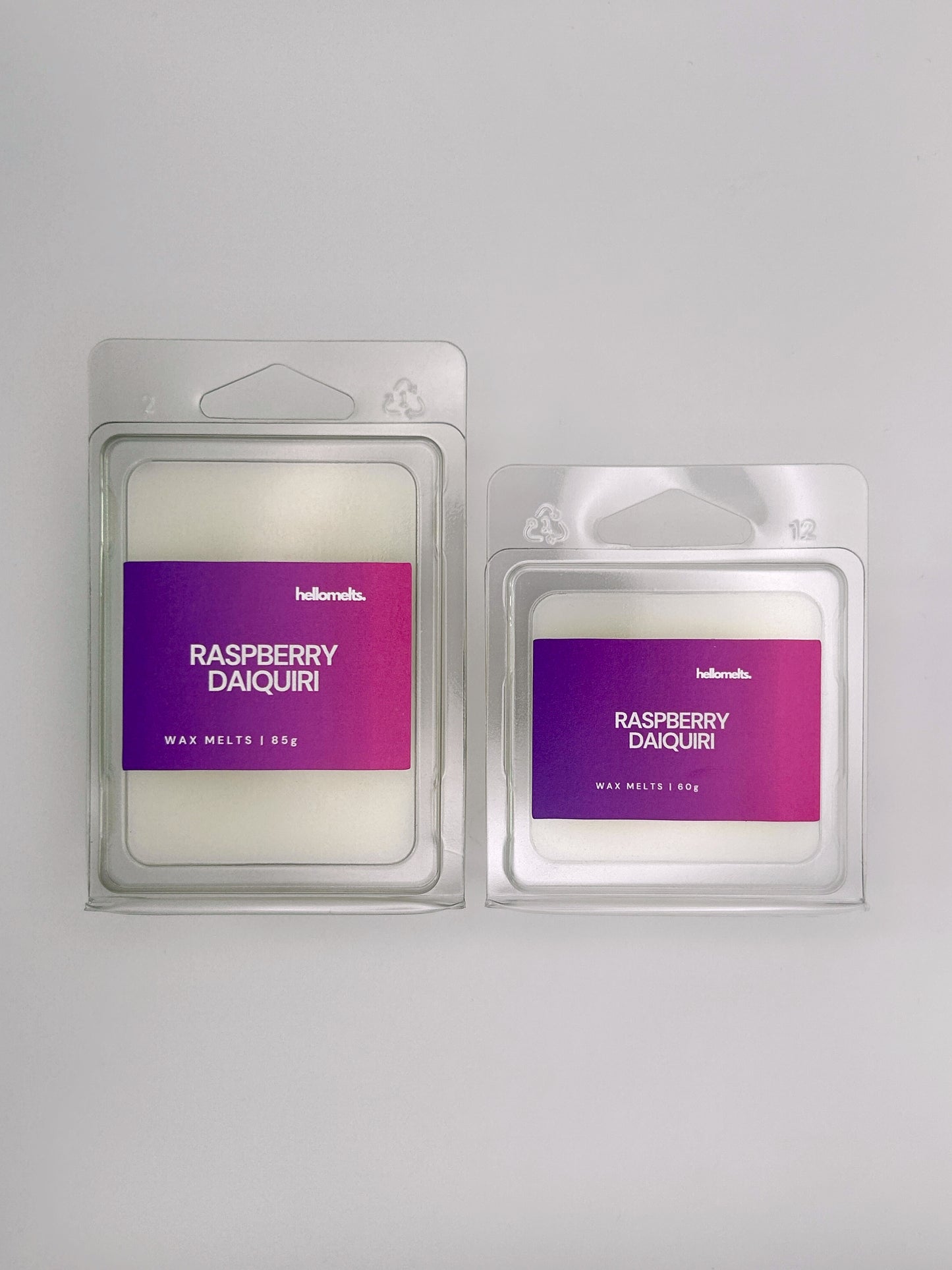 Side-by-side view of Hellomelts Raspberry Daiquiri wax melts in both 85g and 60g sizes from the Summer Collection