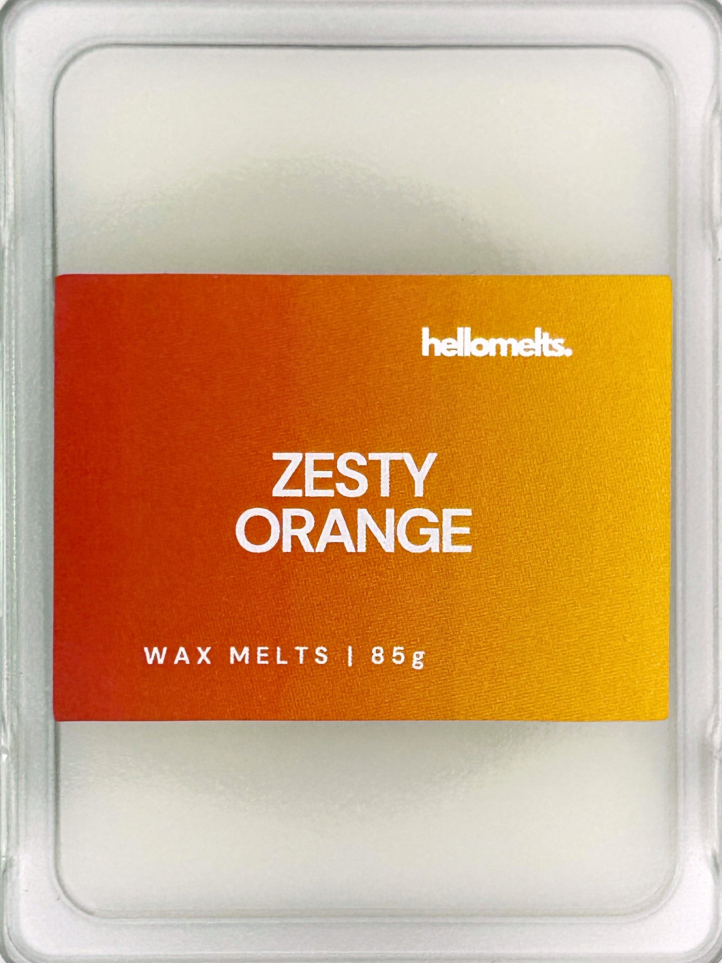 Close-up of the Zesty Orange 85g wax melt label, showing detailed branding and uplifting citrus scent design from Hellomelts