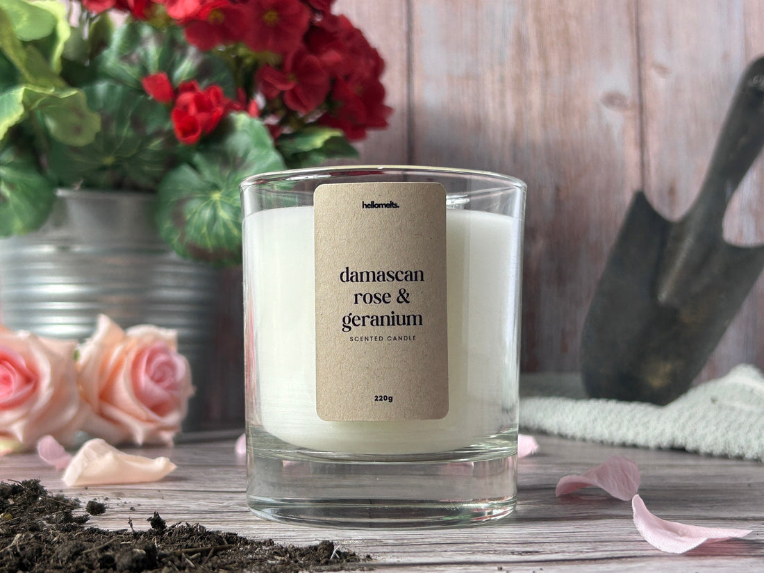 Hellomelts Damascan Rose and Geranium candle styled with flowers for a spring home refresh blog