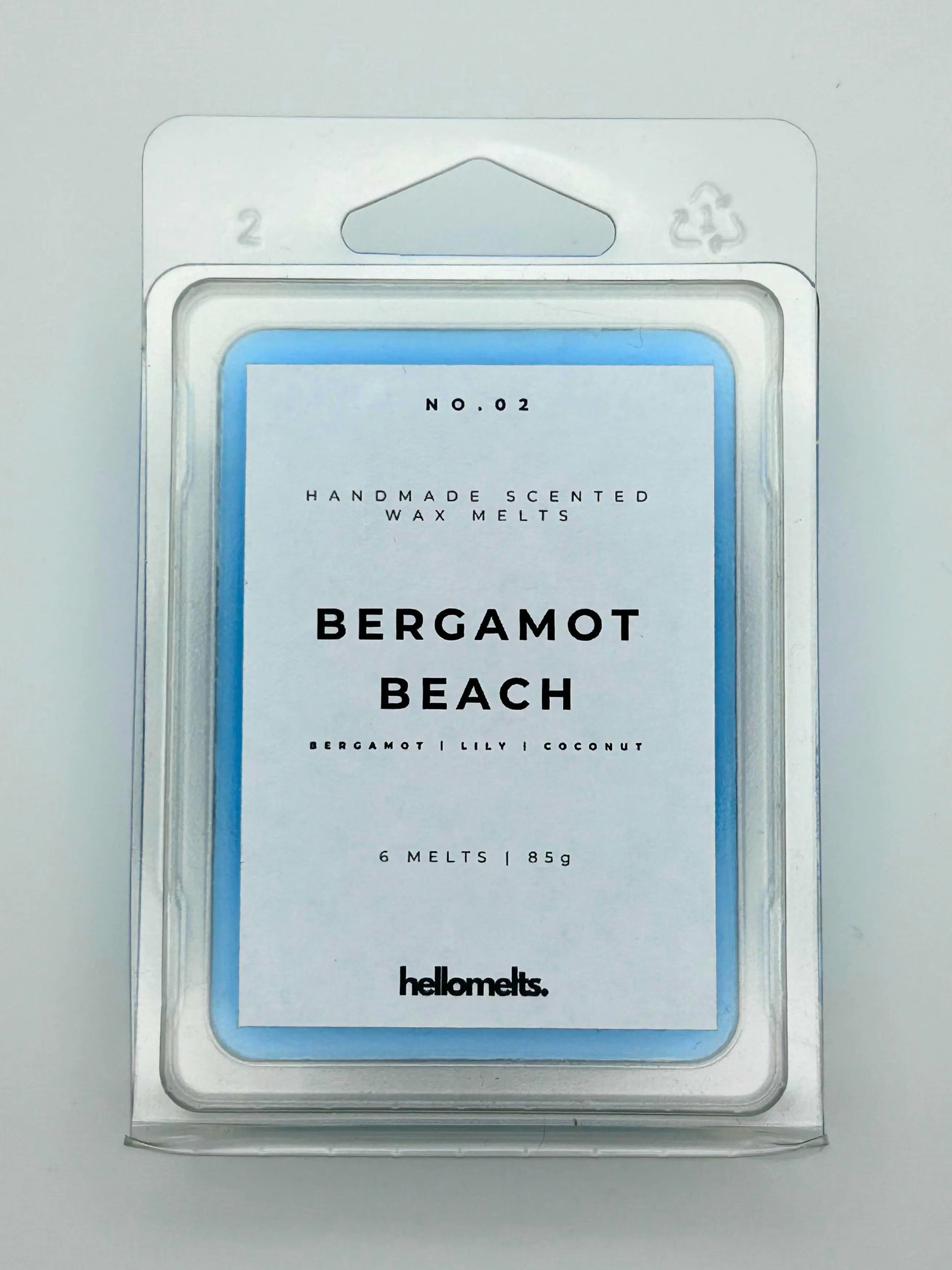 Bergamot Beach 85g wax melt pack, by Hellomelts, showcasing the front with bergamot, lily, and coconut notes, ready to evoke a seaside escape.