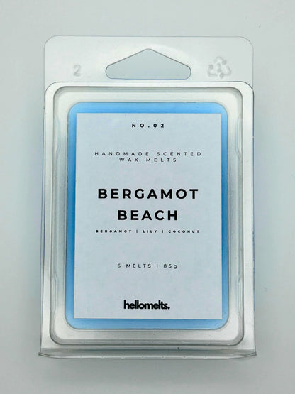 Bergamot Beach 85g wax melt pack, by Hellomelts, showcasing the front with bergamot, lily, and coconut notes, ready to evoke a seaside escape.