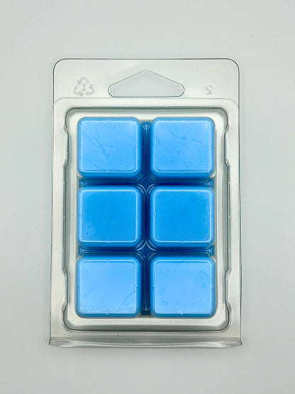 Bergamot Beach 85g wax melt pack, by Hellomelts, showcasing the back with bergamot, lily, and coconut notes, ready to evoke a seaside escape.
