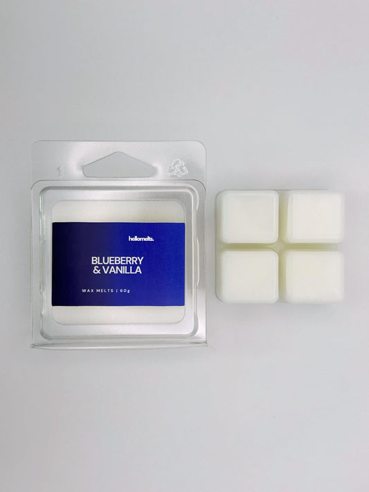 Blueberry & Vanilla 60g wax melt bar by Hellomelts shown beside its clamshell packaging, a fruity scent from the Summer Collection