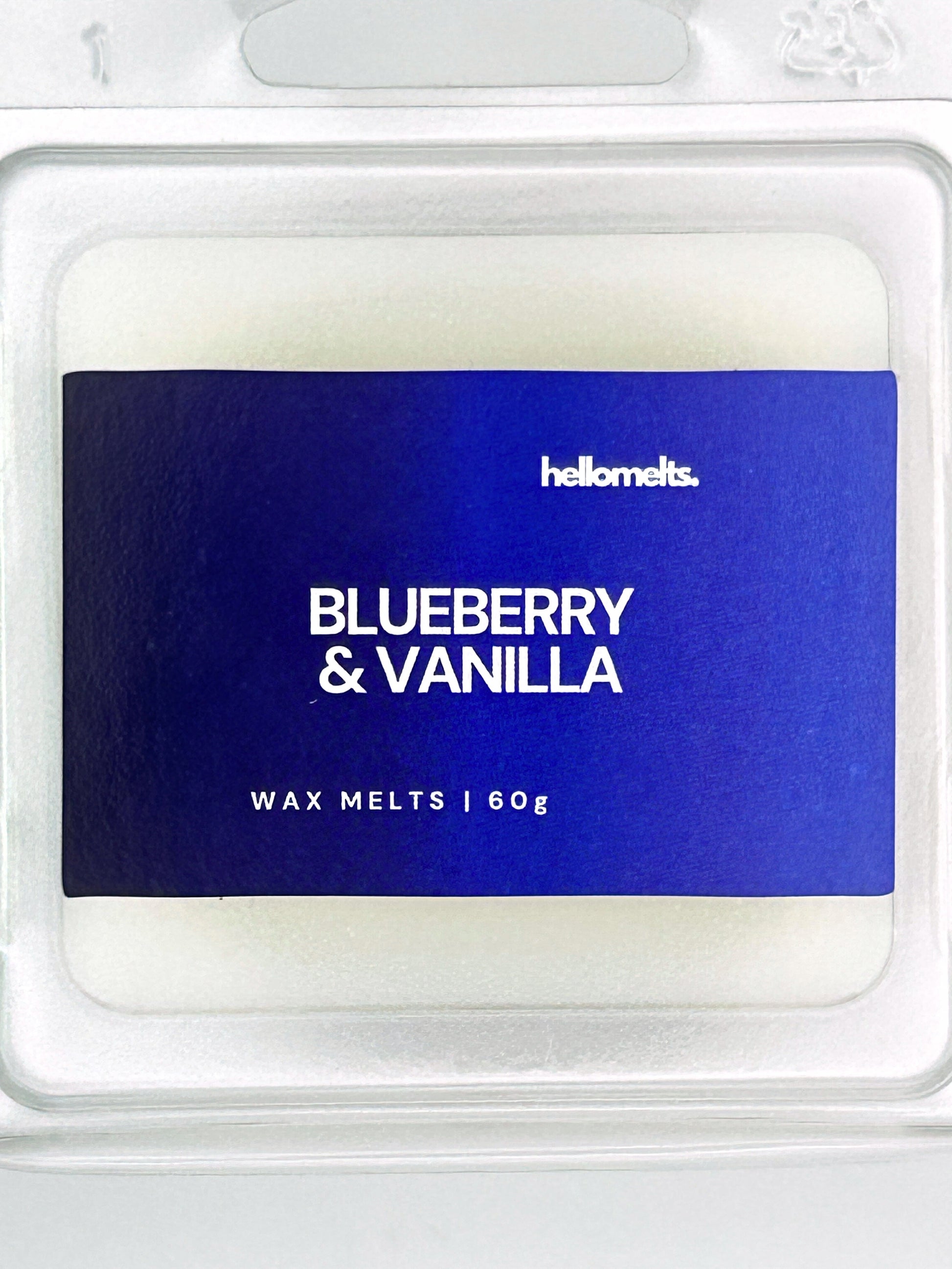 Close-up of the Blueberry & Vanilla 60g wax melt label, showing detailed Hellomelts branding and berry-sweet scent design