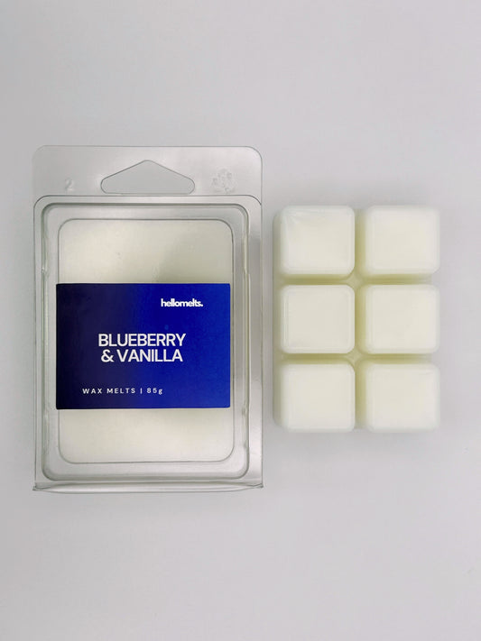 Blueberry & Vanilla 85g wax melt bar by Hellomelts pictured beside its clamshell packaging, part of the Summer Collection