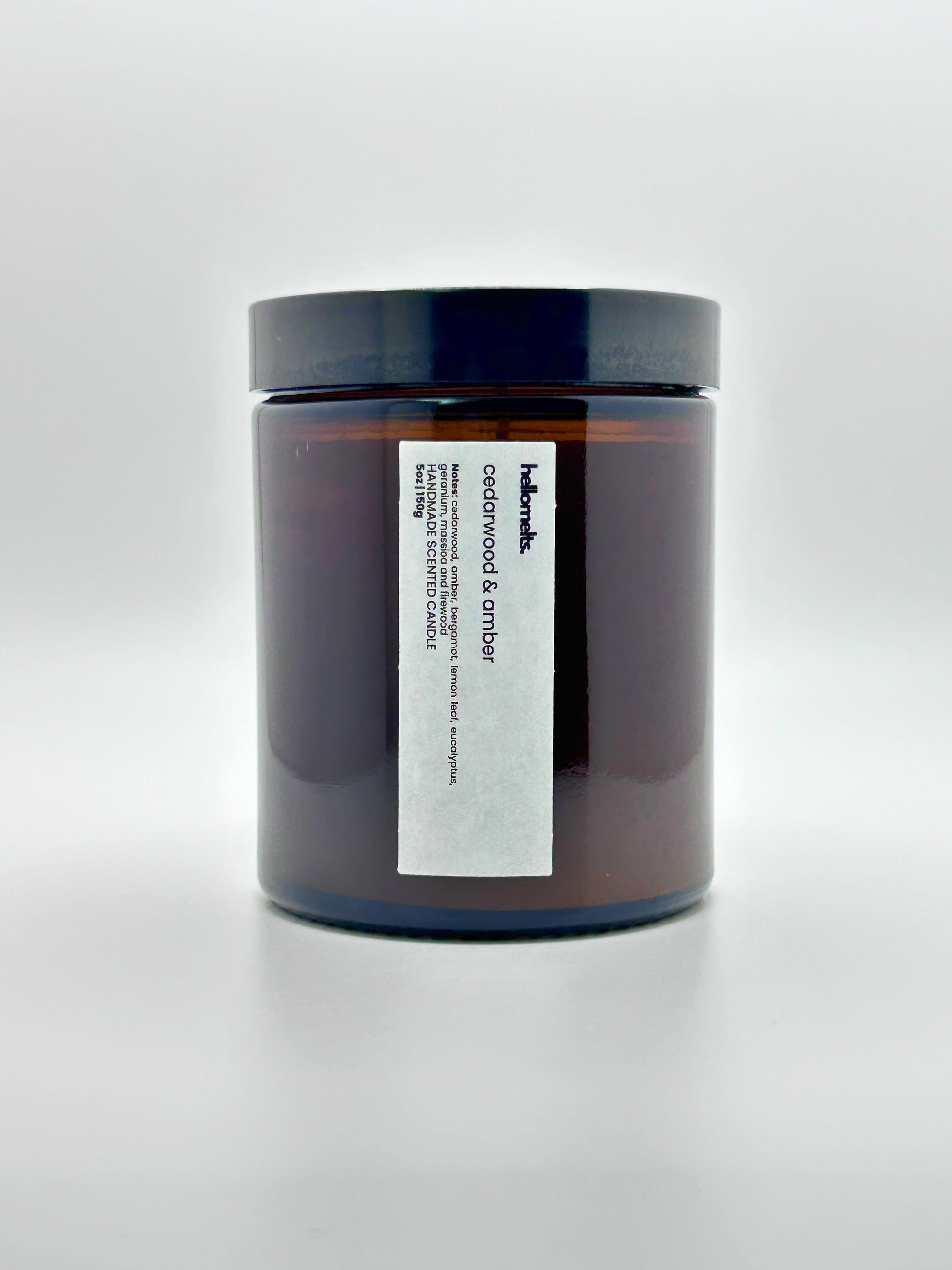 Front view of Cedarwood &  Amber autumn candle by Hellomelts with the lid on, part of the Autumn Collection
