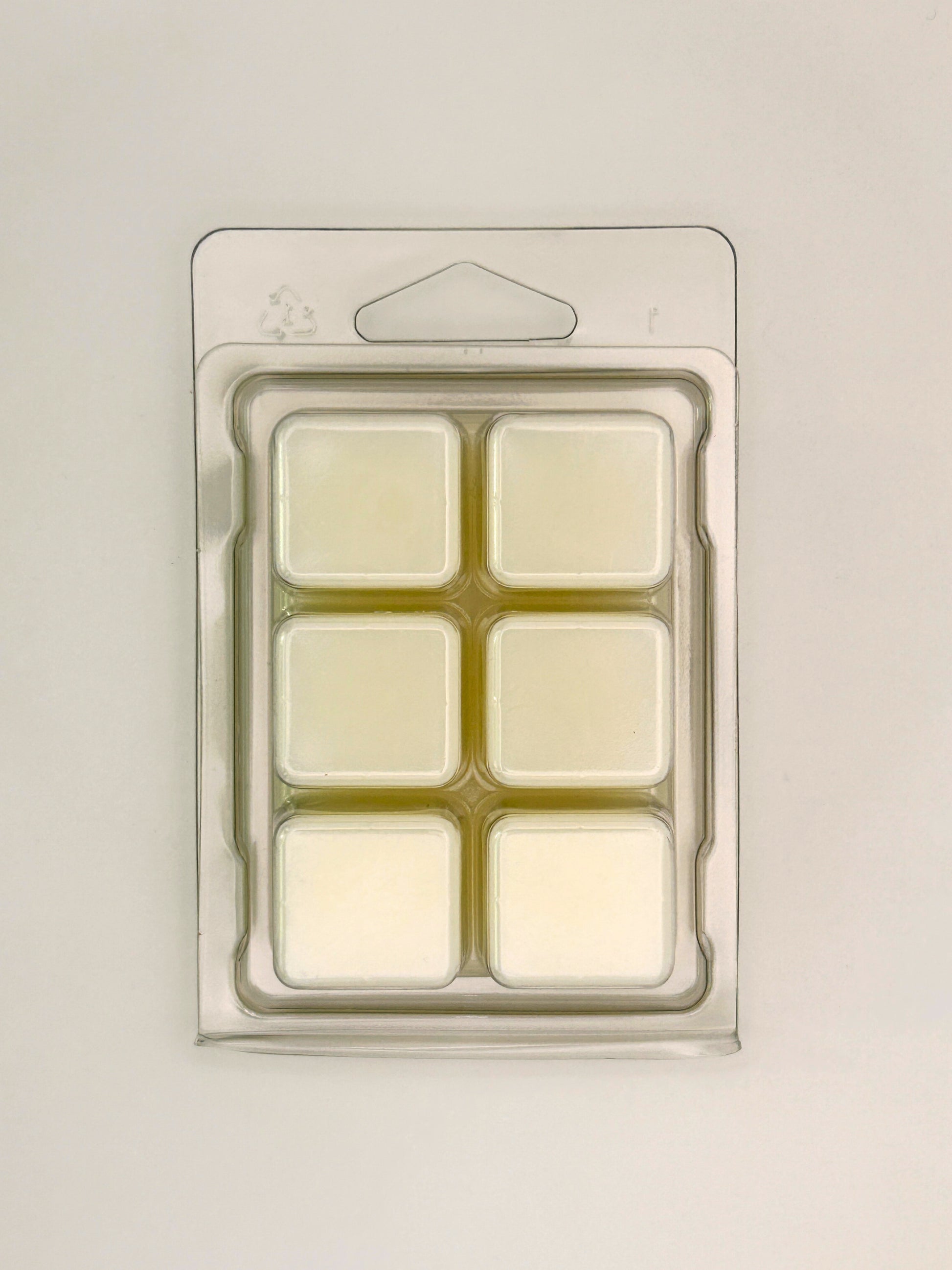 Back of Cedarwood & Amber 85g wax melt clamshell packaging showing the wax inside from the Hellomelts Autumn Collection