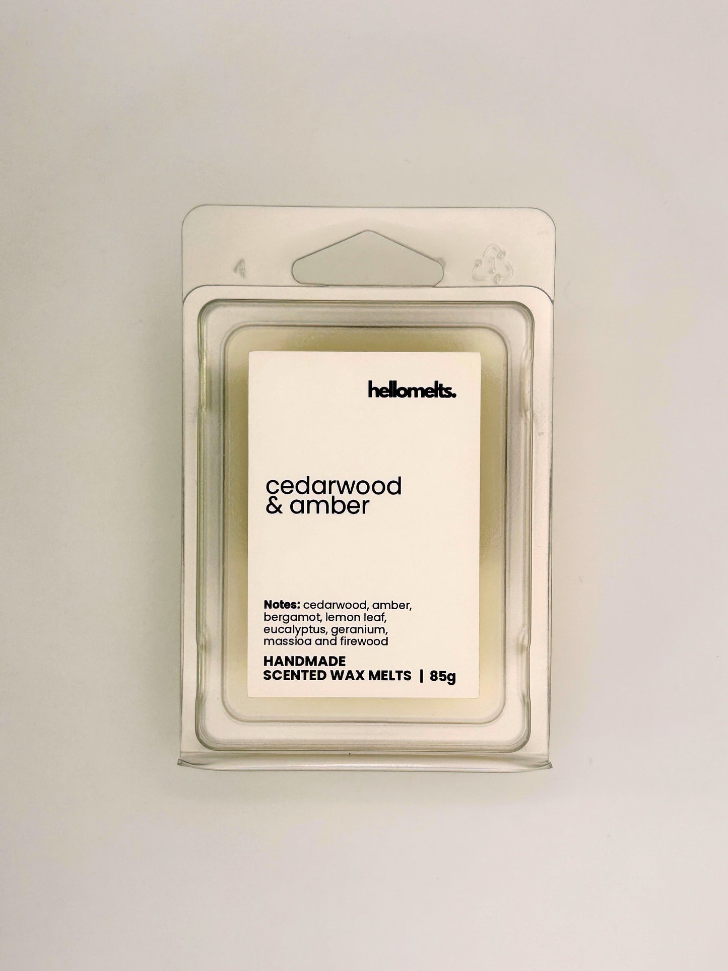 Front view of Cedarwood & Amber 85g wax melt in clear clamshell packaging from the Hellomelts Autumn Collection