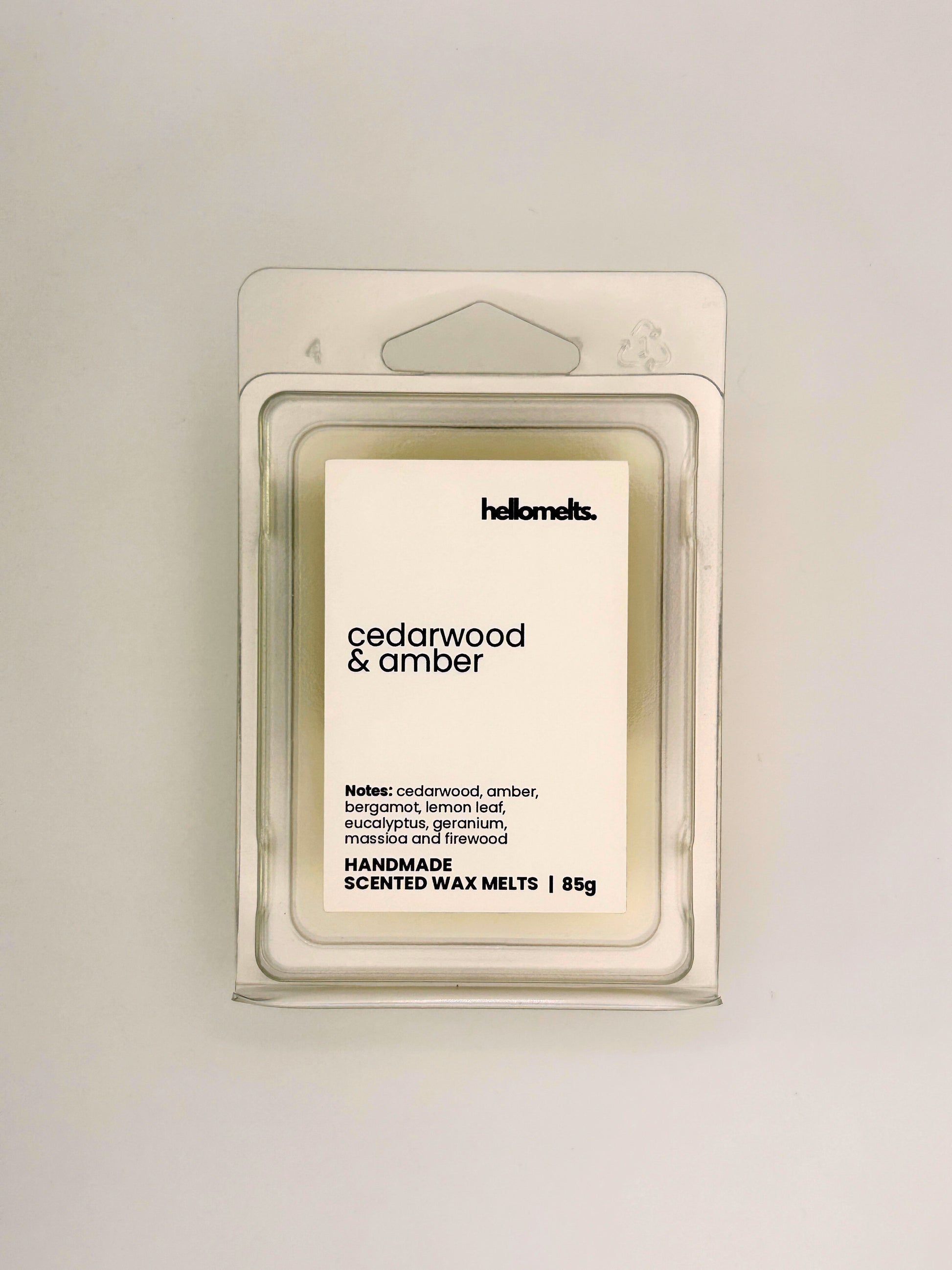 Front view of Cedarwood & Amber 85g wax melt in clear clamshell packaging from the Hellomelts Autumn Collection