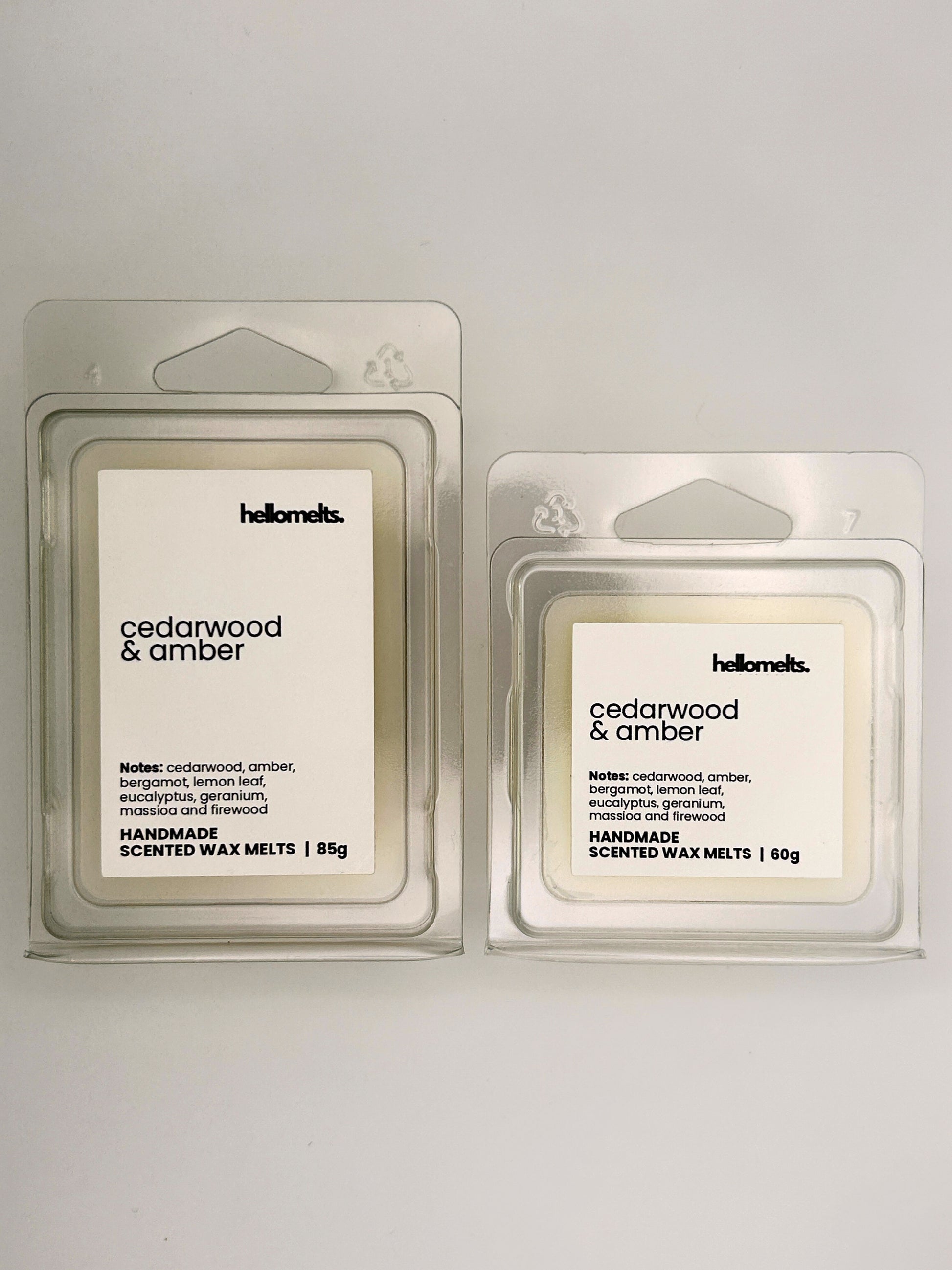 Cedarwood & Amber wax melts in 60g and 85g clamshells shown side by side from the Hellomelts Autumn Collection