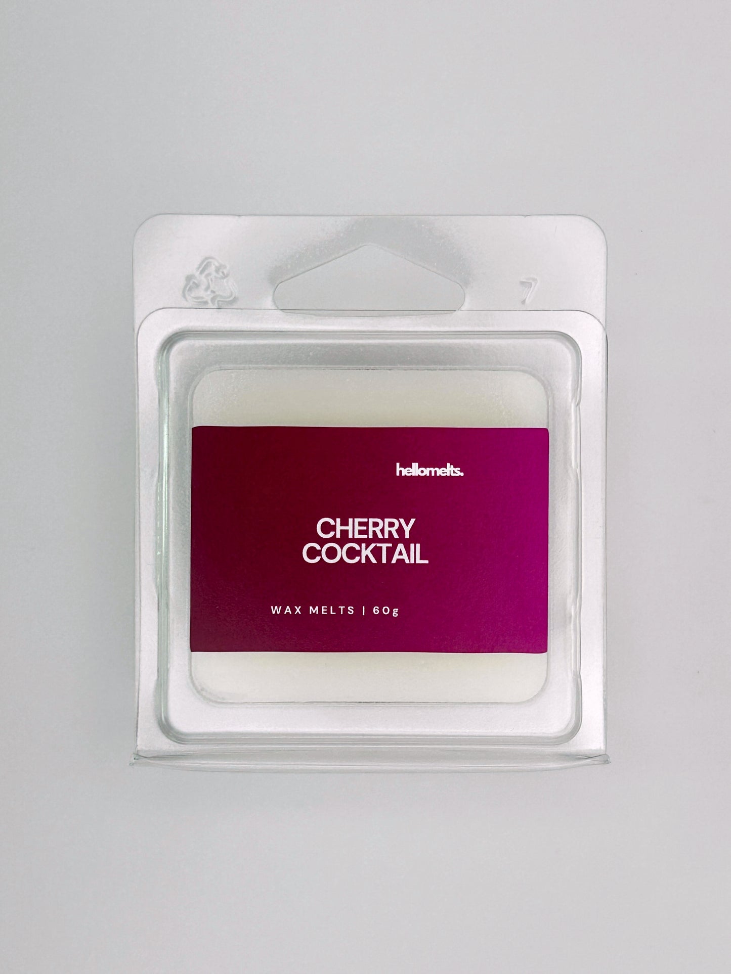 Close-up front view of Cherry Cocktail 60g wax melt bar by Hellomelts, showcasing wax texture and red label design