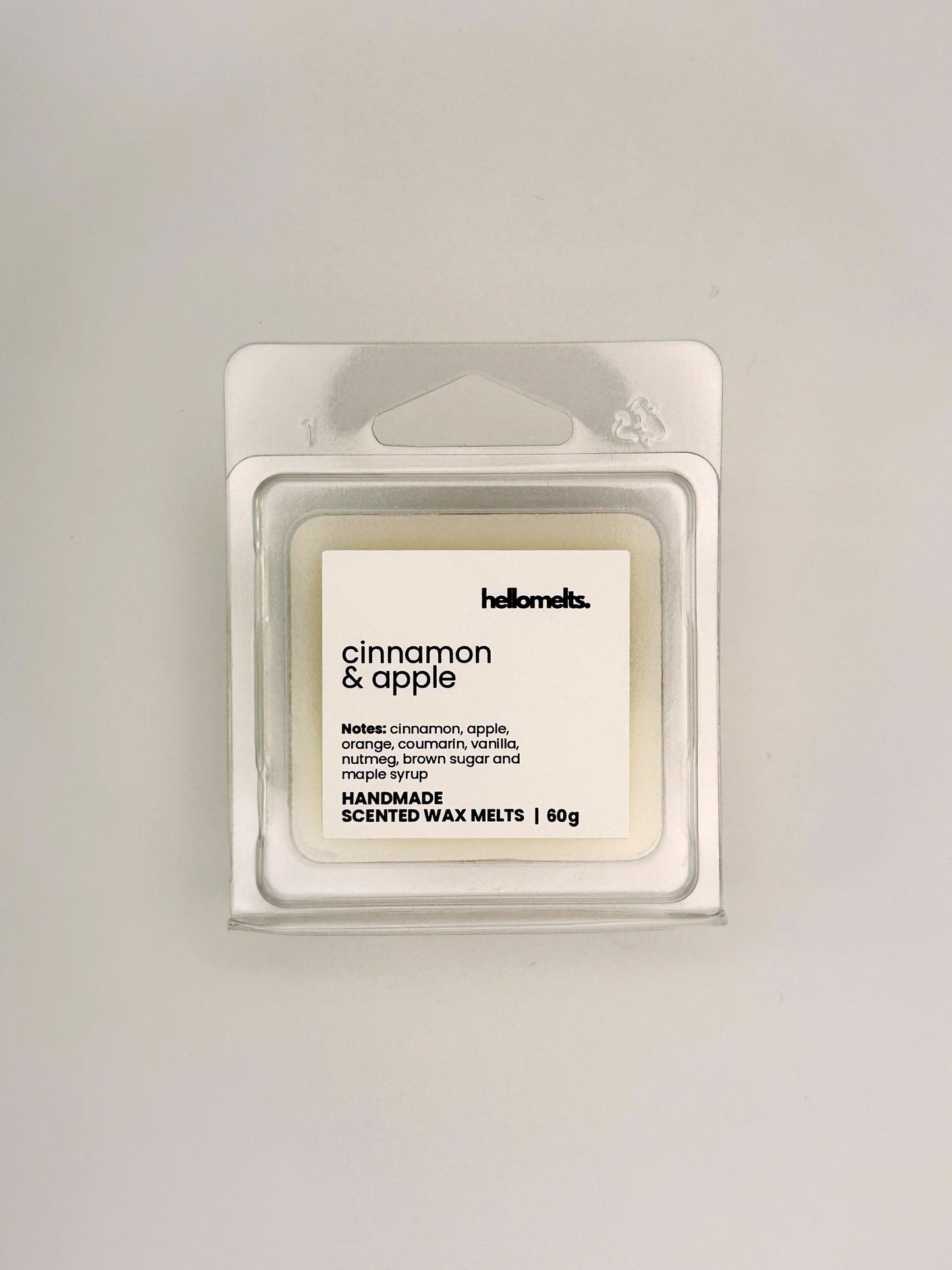 Front view of Cinnamon & Apple 60g wax melt in clear clamshell packaging from the Hellomelts Autumn Collection