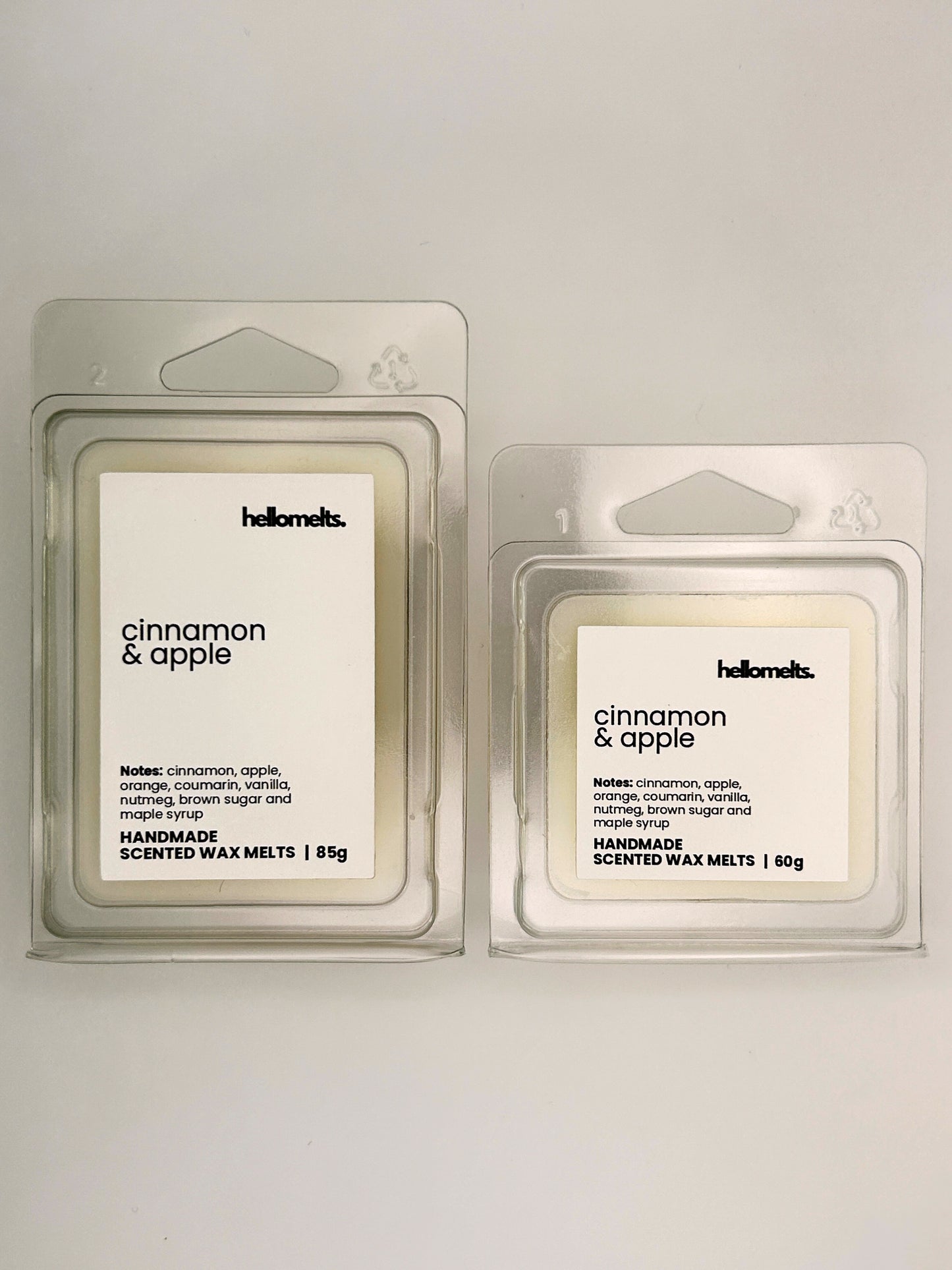 Cinnamon & Apple wax melts in 60g and 85g clamshells shown side by side from the Hellomelts Autumn Collection