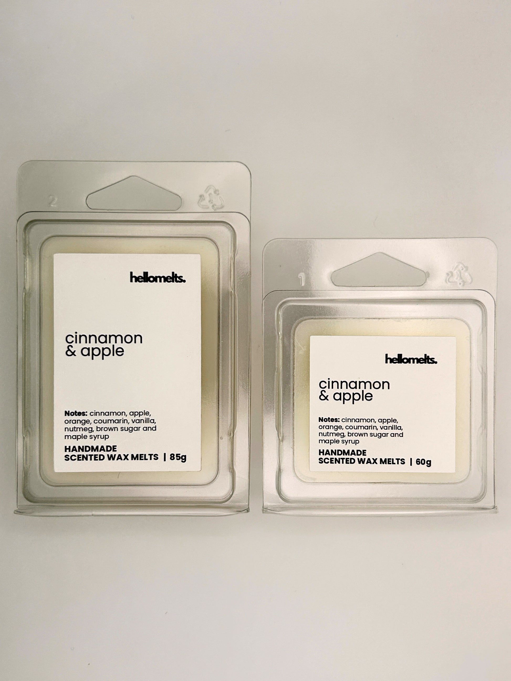 Cinnamon & Apple wax melts in 60g and 85g clamshells shown side by side from the Hellomelts Autumn Collection