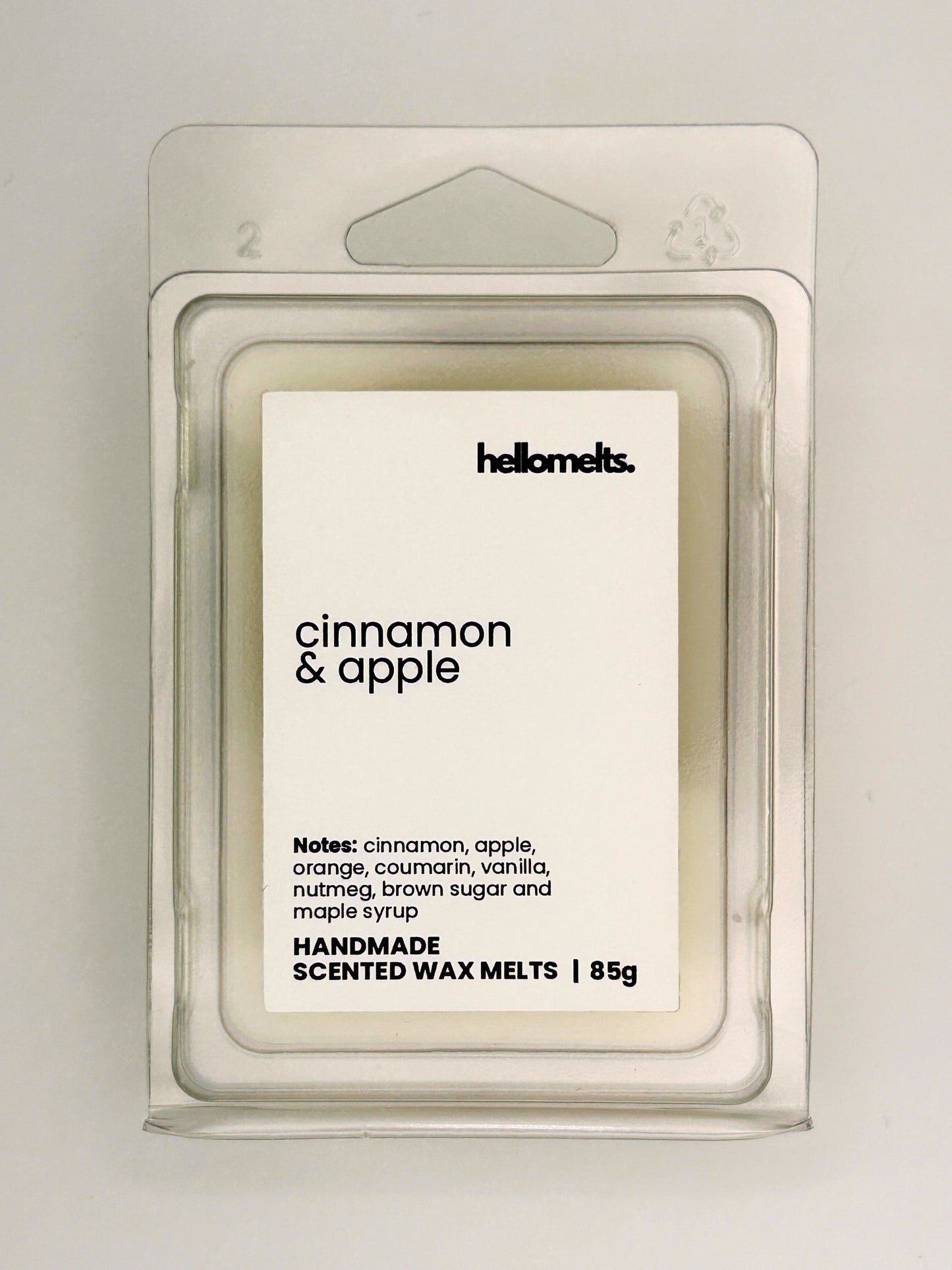 Close up of Cinnamon & Apple 85g wax melt label on clear clamshell packaging from the Hellomelts Autumn Collection