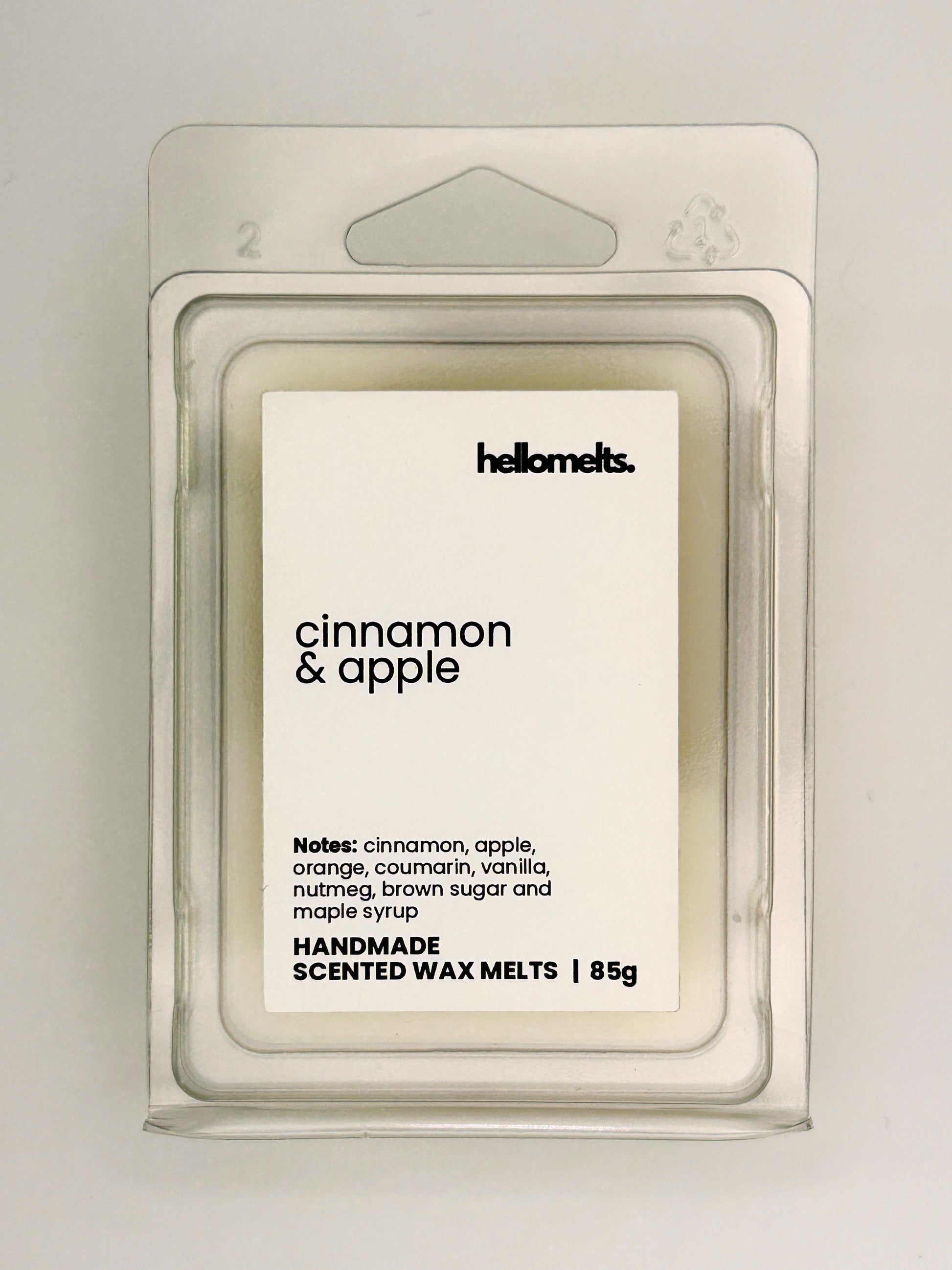 Close up of Cinnamon & Apple 85g wax melt label on clear clamshell packaging from the Hellomelts Autumn Collection