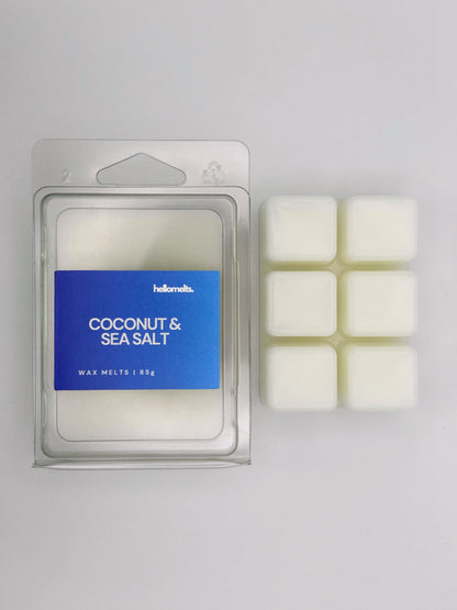 Coconut & Sea Salt 85g wax melt bar by Hellomelts pictured beside its clamshell packaging, part of the Summer Collection