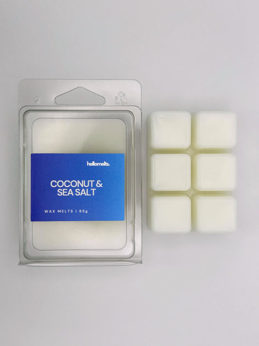 Coconut & Sea Salt 85g wax melt bar by Hellomelts pictured beside its clamshell packaging, part of the Summer Collection