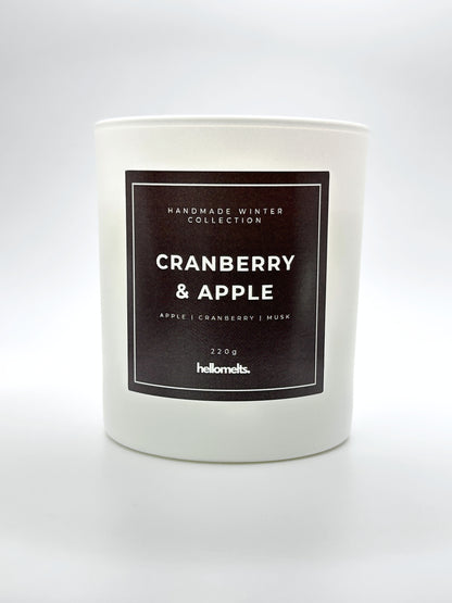 Cranberry & Apple 220g candle front-facing studio shot without the lid, showing the clean white jar and label from the Hellomelts Winter Collection