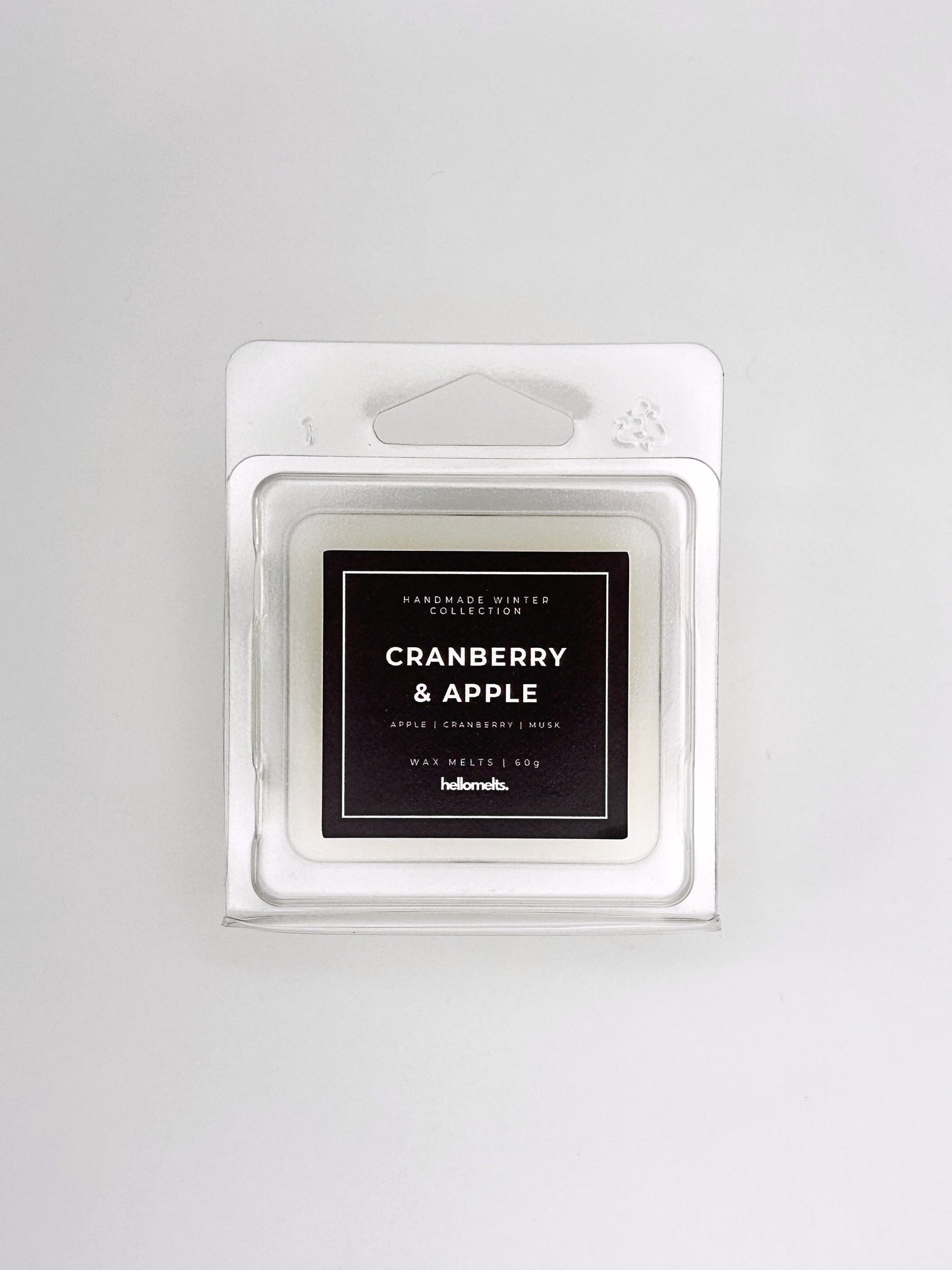 Cranberry & Apple 60g wax melt front-facing studio shot showing the clamshell packaging from the Hellomelts Winter Collection