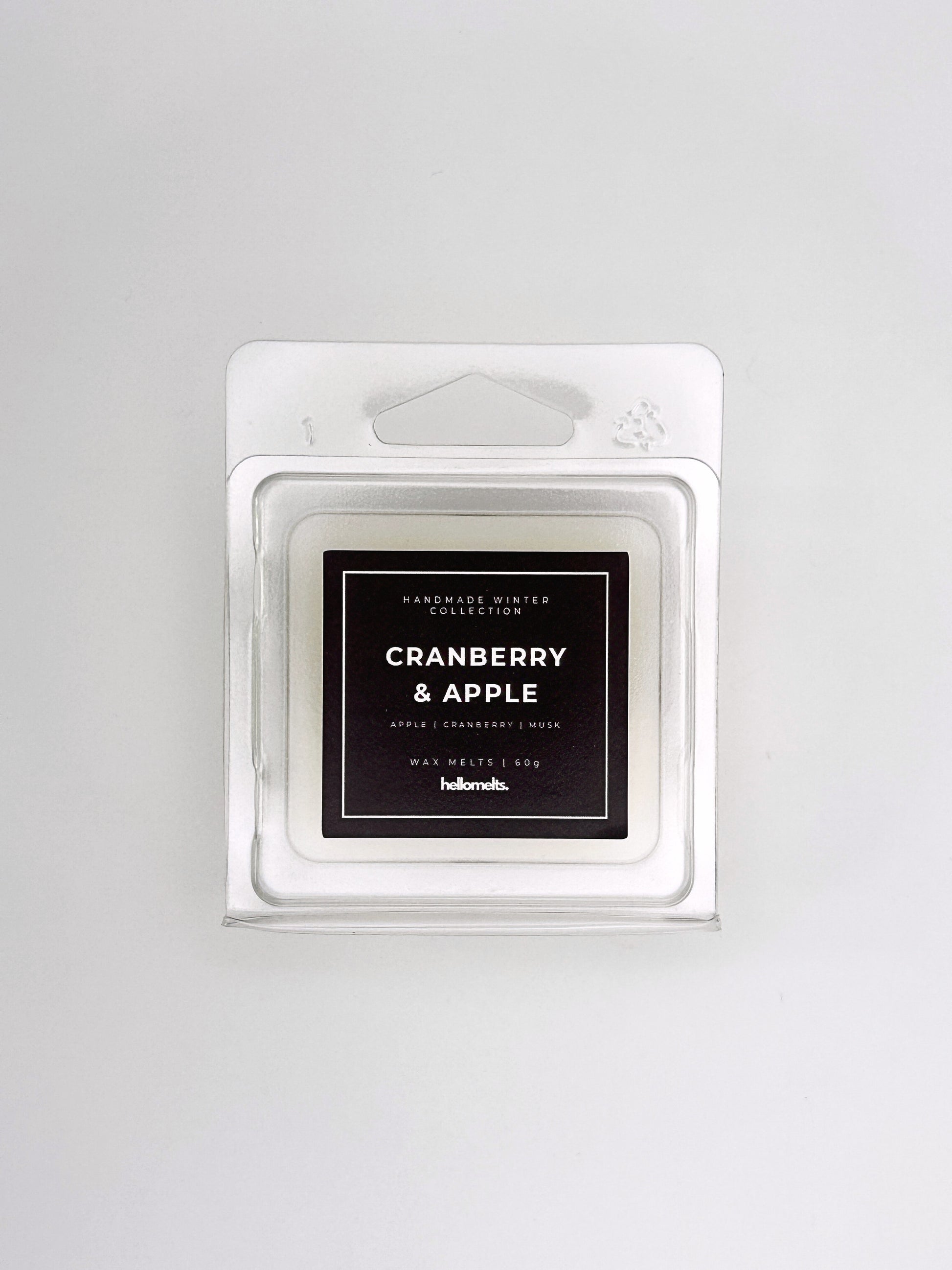 Cranberry & Apple 60g wax melt front-facing studio shot showing the clamshell packaging from the Hellomelts Winter Collection
