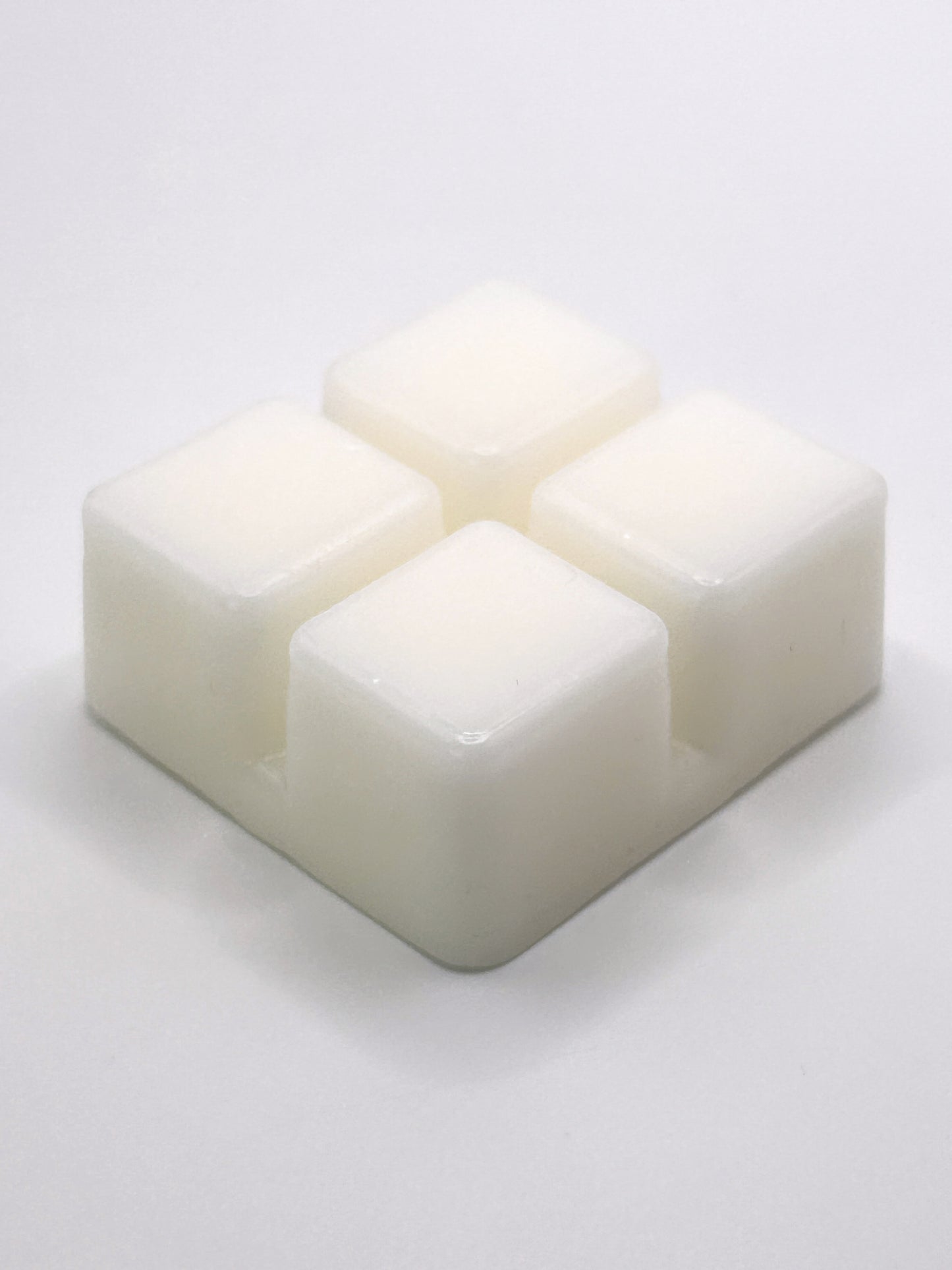 Cranberry & Apple 60g wax melt angled close-up showing the smooth surface of the wax cubes from the Hellomelts Winter Collection