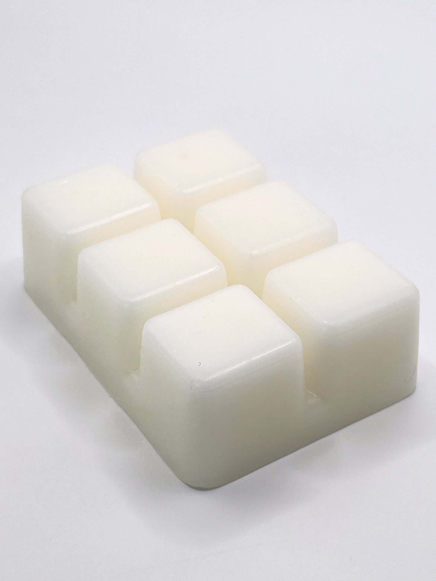 Cranberry & Apple 85g wax melt angled close-up showing the smooth surface of the wax cubes from the Hellomelts Winter Collection