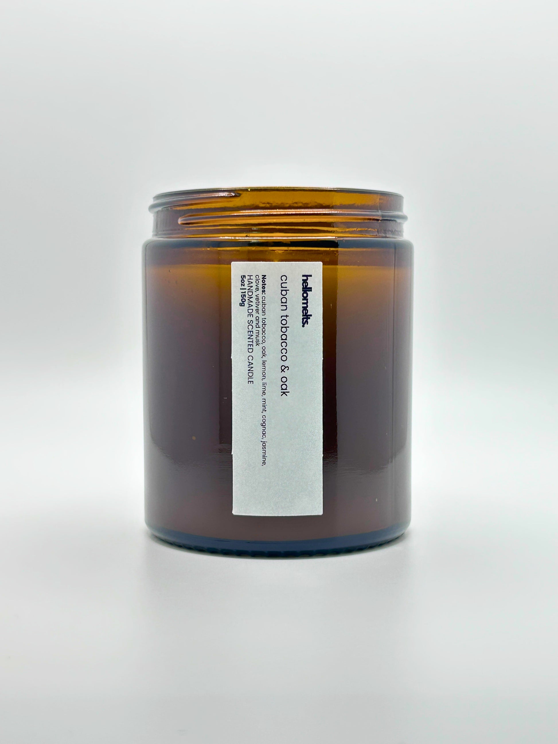 Front view of Cuban Tobacco & Oak autumn scented candle by Hellomelts with the lid off, part of the Autumn Collection
