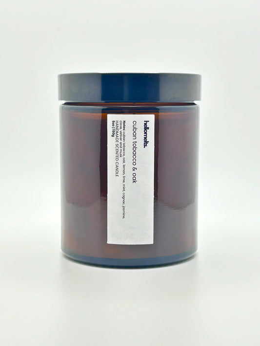 Front view of Cuban Tobacco & Oak scented candle by Hellomelts with the lid on, part of the autumn collection.