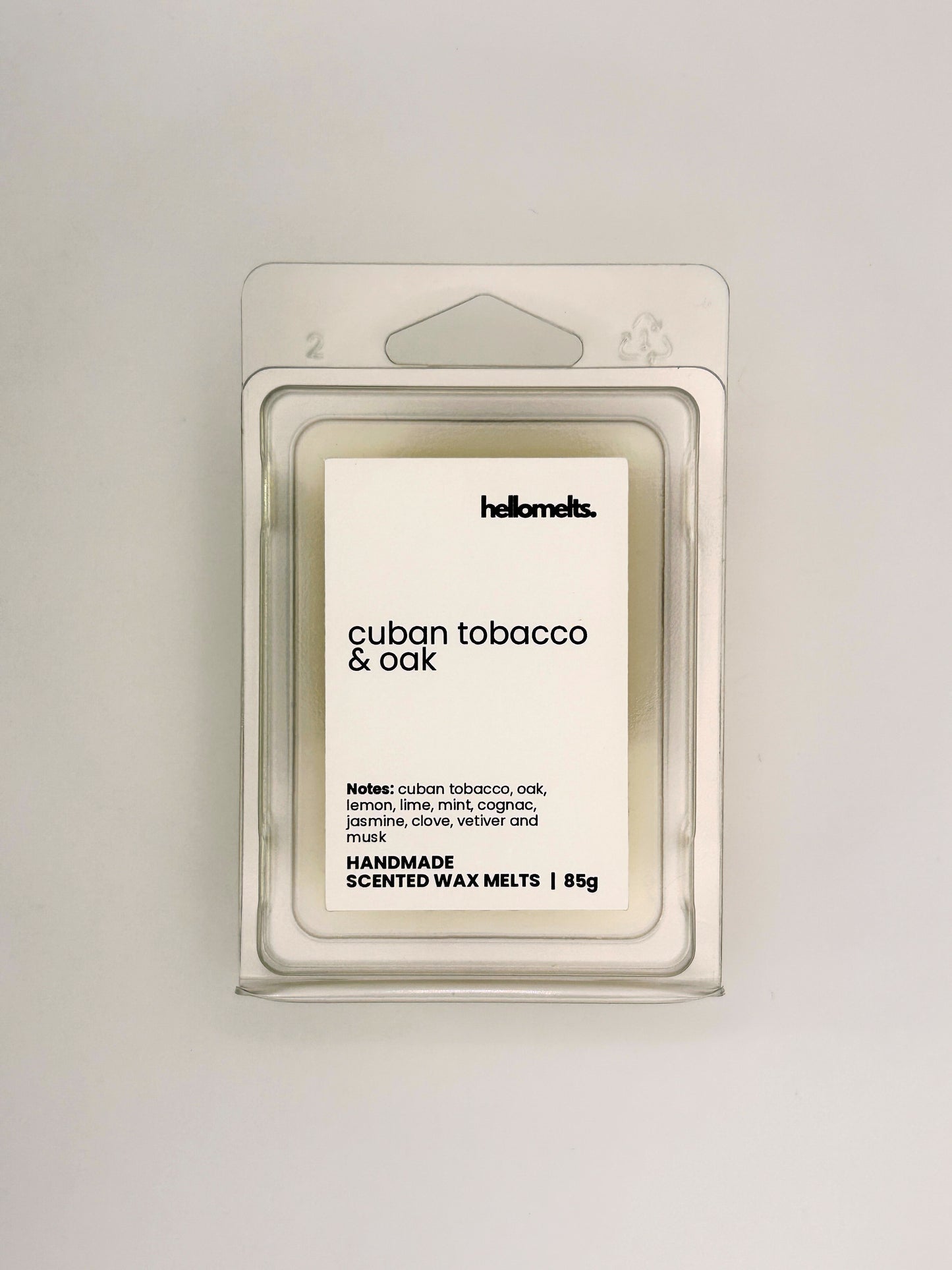 Front view of Cuban Tobacco & Oak 85g wax melt in clear clamshell packaging from the Hellomelts Autumn Collection