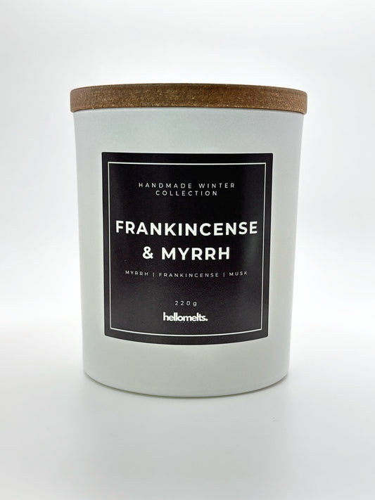 Frankincense & Myrrh 220g candle front-facing studio shot with wooden lid on, part of the Hellomelts Winter Collection