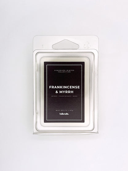 Frankincense & Myrrh 85g wax melt front-facing studio shot showing the clamshell packaging from the Hellomelts Winter Collection